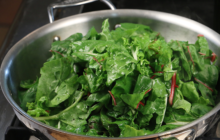 Sauted Swiss Chard with Cranberries & Pumpkin Seeds