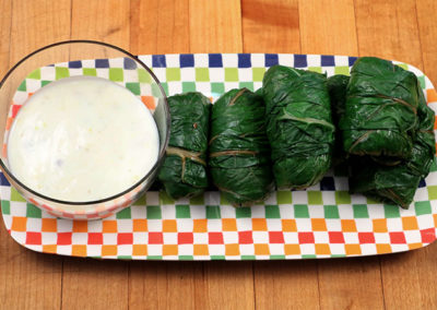 Swiss Chard Rolls with Lemon Caper Yogurt Sauce